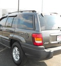jeep grand cherokee 2004 gray suv gasoline 6 cylinders rear wheel drive 4 speed automatic 43228