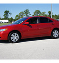 toyota camry 2009 red sedan le gasoline 4 cylinders front wheel drive automatic 33870