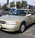 nissan altima 1998 gold sedan gxe gasoline 4 cylinders front wheel drive automatic 94063