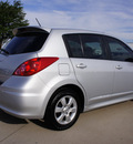 nissan versa 2011 silver hatchback 1 8 sl gasoline 4 cylinders front wheel drive automatic with overdrive 76018