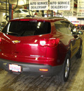 chevrolet traverse 2011 red gasoline 6 cylinders all whee drive automatic 14580