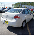 ford focus 2009 white sedan se gasoline 4 cylinders front wheel drive automatic with overdrive 07724