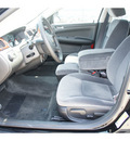 chevrolet impala 2011 black sedan ls flex fuel 6 cylinders front wheel drive 4 spd auto elec cntlled o 77090
