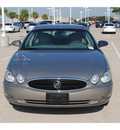 buick lacrosse 2006 brown sedan cx gasoline 6 cylinders front wheel drive automatic 77065