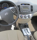 hyundai elantra 2010 white sedan gasoline 4 cylinders front wheel drive automatic 77037