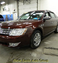 ford taurus 2009 red sedan limited gasoline 6 cylinders front wheel drive automatic 14304
