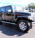 jeep wrangler unlimited 2011 black suv 70th anniversary gasoline 6 cylinders 4 wheel drive automatic 32401