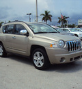 jeep compass 2010 gold suv sport gasoline 4 cylinders 2 wheel drive automatic 33157