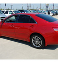 toyota camry 2010 red sedan le 4 cylinders front wheel drive automatic 77090