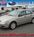 ford focus 2006 gold sedan zx4 se gasoline 4 cylinders front wheel drive automatic with overdrive 55811