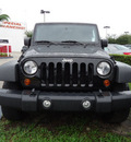 jeep wrangler unlimited 2010 black suv sport gasoline 6 cylinders 2 wheel drive automatic 33157