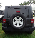 jeep wrangler unlimited 2010 black suv sport gasoline 6 cylinders 2 wheel drive automatic 33157