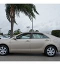 toyota camry 2009 tan sedan le gasoline 4 cylinders front wheel drive automatic 33870