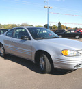 pontiac grand am 1999 silver coupe gasoline v6 front wheel drive automatic 80911