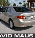 toyota corolla 2009 gold sedan le gasoline 4 cylinders front wheel drive automatic 32771