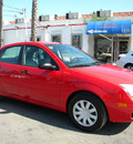 ford focus 2005 red sedan zx4 se gasoline 4 cylinders front wheel drive automatic 92882