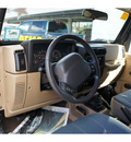 jeep wrangler 2002 black suv sahara gasoline 6 cylinders 4 wheel drive 5 speed manual 08844