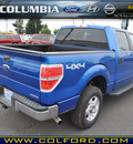 ford f 150 2011 blue xlt 8 cylinders 4 wheel drive automatic with overdrive 98632
