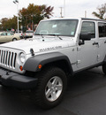 jeep wrangler unlimited 2009 silver suv rubicon gasoline 6 cylinders 4 wheel drive 6 speed manual 07730