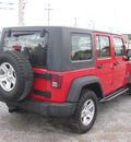 jeep wrangler unlimited 2010 red suv sport rhd gasoline 6 cylinders 4 wheel drive automatic 62863