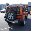 jeep wrangler 2011 orange suv sahara gasoline 6 cylinders 4 wheel drive automatic with overdrive 08844