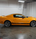 ford mustang 2009 orange coupe gt premium gasoline 8 cylinders rear wheel drive 5 speed manual 76108
