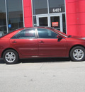 toyota camry 2005 maroon sedan le gasoline 6 cylinders front wheel drive automatic 33884