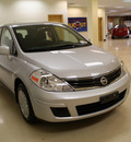 nissan versa 2010 silver hatchback 1 8 s gasoline 4 cylinders front wheel drive automatic 27707