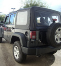 jeep wrangler unlimited 2012 black suv sport gasoline 6 cylinders 4 wheel drive automatic 33157