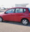 chevrolet aveo 2009 red hatchback aveo5 ls gasoline 4 cylinders front wheel drive 5 speed manual 55318
