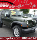 jeep wrangler unlimited 2009 green suv x gasoline 6 cylinders 4 wheel drive automatic 91761
