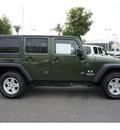 jeep wrangler unlimited 2009 green suv x gasoline 6 cylinders 4 wheel drive automatic 91761