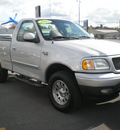 ford f 150 2002 silver pickup truck gasoline 8 cylinders 4 wheel drive automatic with overdrive 13502