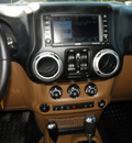 jeep wrangler unlimited 2011 tan suv sahara gasoline 6 cylinders 4 wheel drive automatic 32447