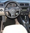 volkswagen jetta 2012 brown sedan se w convenience sunroof gasoline 5 cylinders front wheel drive automatic 98226