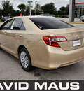 toyota camry 2012 gold sedan 4 cylinders front wheel drive automatic 32771