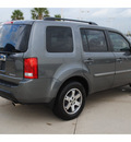 honda pilot 2010 dk  gray suv touring w navi gasoline 6 cylinders front wheel drive automatic with overdrive 77065
