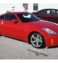 nissan 350z 2006 red coupe gasoline 6 cylinders rear wheel drive 6 speed manual 77388