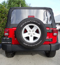 jeep wrangler 2012 red suv sport gasoline 6 cylinders 4 wheel drive 6 speed manual 33157