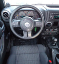 jeep wrangler unlimited 2012 black suv sport gasoline 6 cylinders 4 wheel drive 6 speed manual 33157