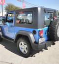 jeep wrangler 2010 lt  blue suv islander gasoline 6 cylinders 4 wheel drive automatic 78238