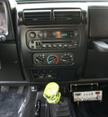 jeep wrangler 2004 green suv x gasoline 6 cylinders 4 wheel drive 5 speed manual 98371