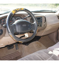 ford f 150 1997 tan xlt gasoline v6 rear wheel drive automatic 77388