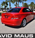 bmw 128i 2009 red coupe gasoline 6 cylinders rear wheel drive automatic 32771
