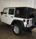 jeep wrangler unlimited 2010 white suv sport gasoline 6 cylinders 4 wheel drive automatic 76108