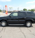 cadillac escalade 2002 black suv gasoline 8 cylinders all whee drive automatic 67210