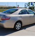 toyota camry 2009 tan sedan gasoline 4 cylinders front wheel drive automatic 77065