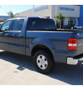 ford f 150 2004 dk  blue xlt gasoline 8 cylinders rear wheel drive automatic with overdrive 77065