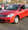 nissan versa 2009 red hatchback 1 8 sl gasoline 4 cylinders front wheel drive cont  variable trans  06019