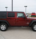 jeep wrangler unlimited 2010 red suv sport gasoline 6 cylinders 4 wheel drive automatic with overdrive 76087